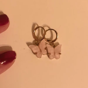 Fjärilar örhängen - Ljusrosa 