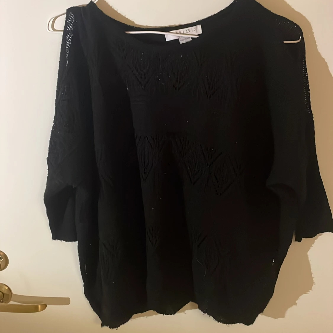 Stickad skön svart tröja 