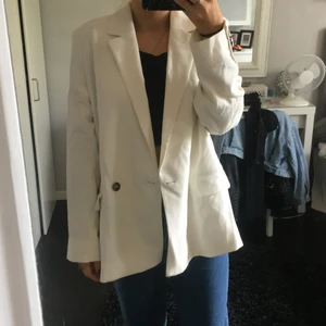 Kavaj  - En vit kavaj 