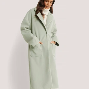 Ljusgrön kappa - Kan mötas upp i Östersund, eller kan skickas köparen står för frakten.