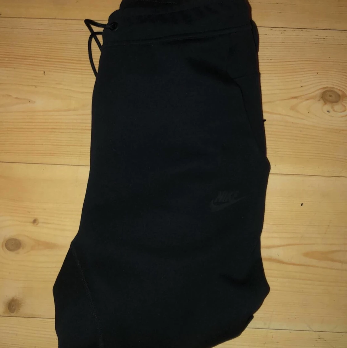 Nike tech fleece byxor svarta