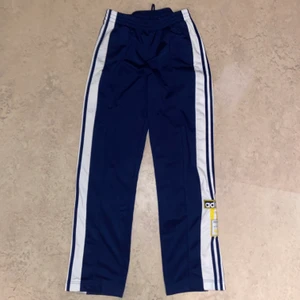 Adidas byxor vida me knappar - Adidas byxor vida med knappar