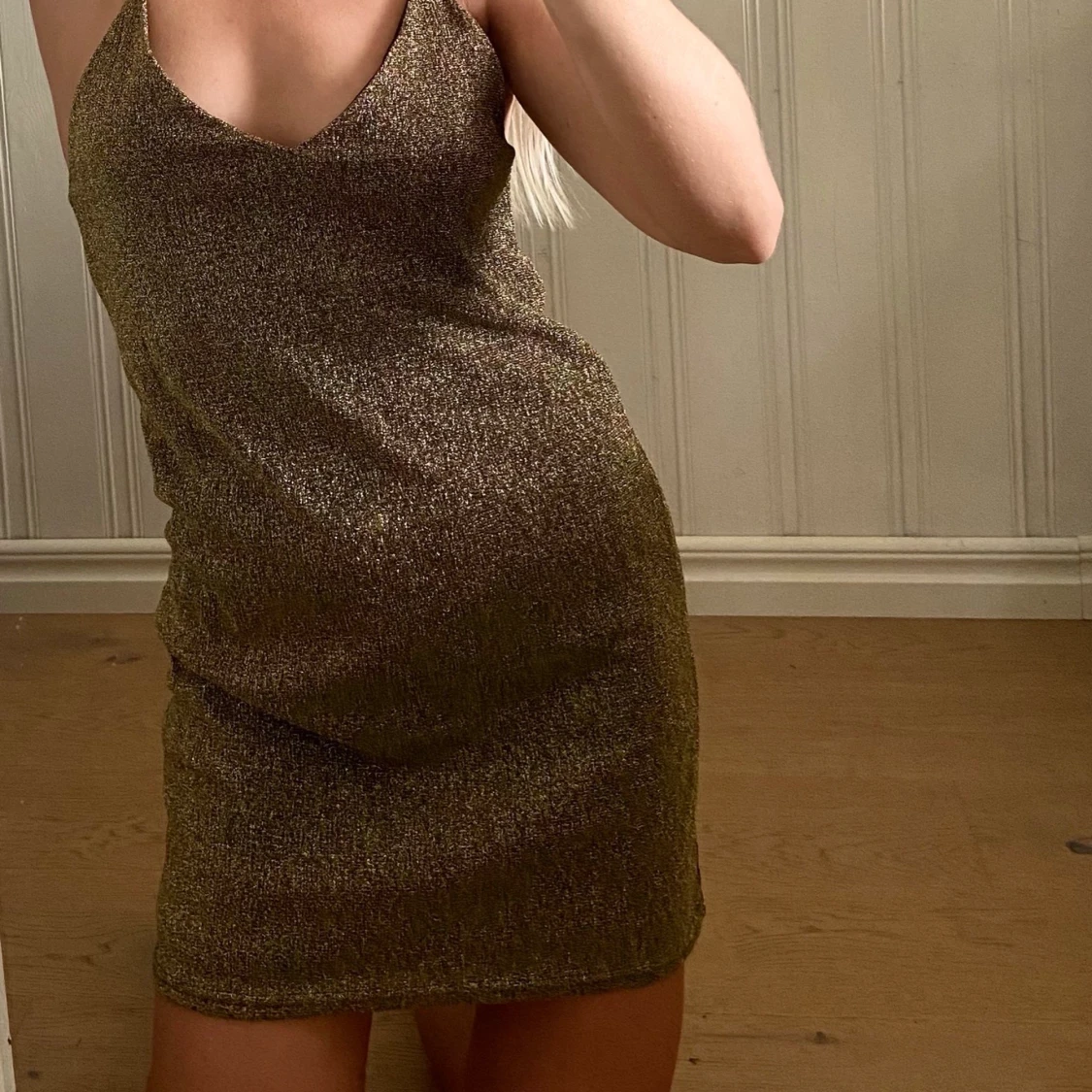 Glittrig kortklänning 