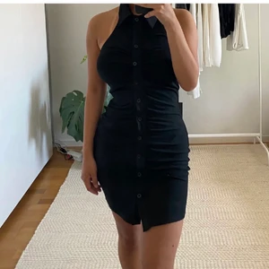 Svart klänning  - Nyskick 