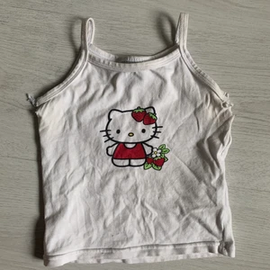 Cropped hello kitty linne - Lite trasigt i armhålorna, annars perfekt supergulligt.