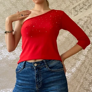 Vintage topp - Vintage topp från Humana. One shoulder och paljetter. Stretchigt material. Passar XS-M. 