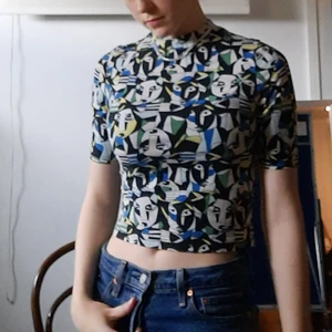 Monki top with pattern  - Tight fit, short top . Good condition