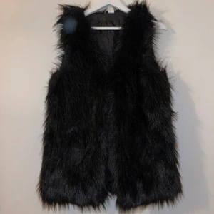 Väst  - Väst i jätte fint skick knappt använd stolrek 40 finns så man kan ha på bälte