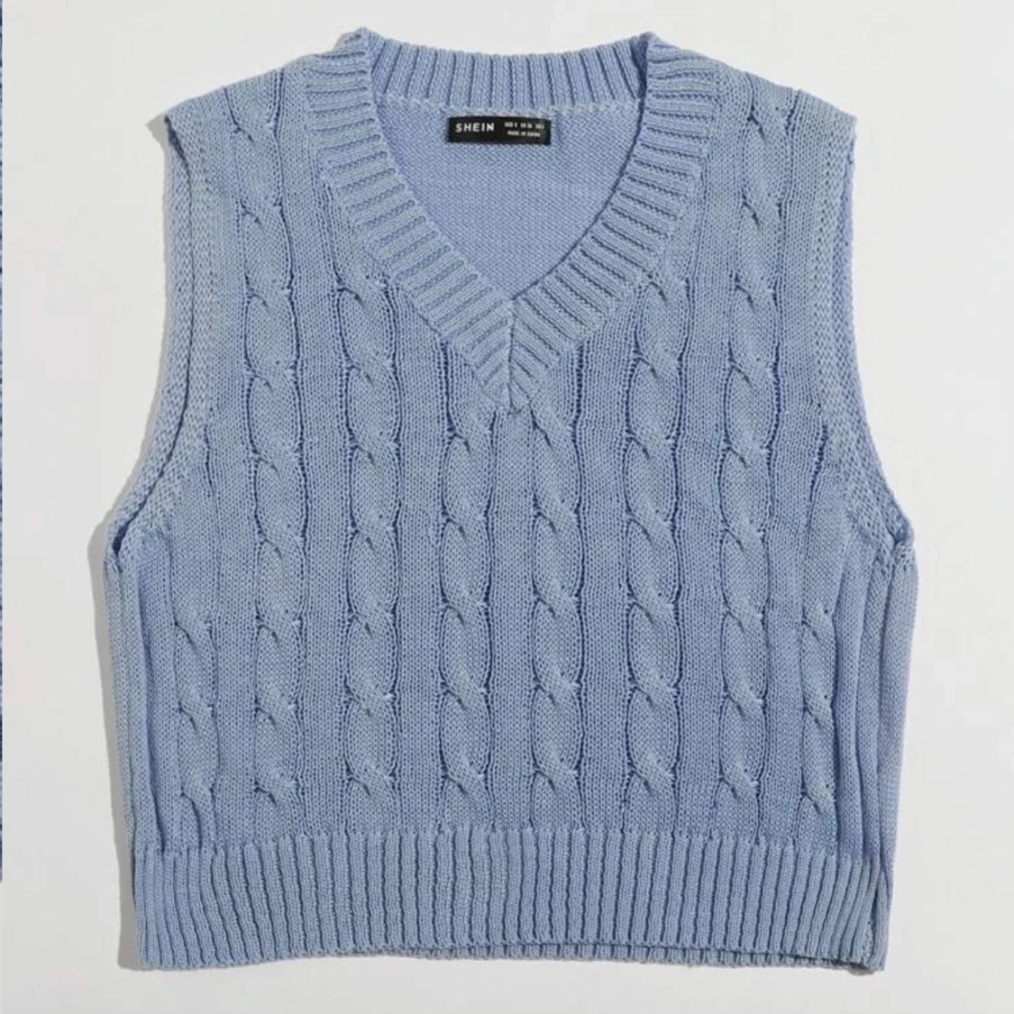 Blue sweater vest storlek S - 90