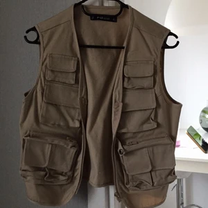 Beige väst - Väldigt bra skick