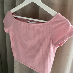 Topp - Rosa fetstopp från Nelly