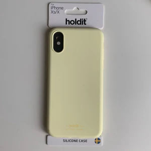 Ljusgult holdit skal - Oanvänt holdit skal i ljusgul färg. Till iPhone Xs/X #skal