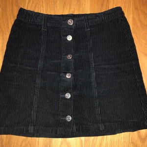 Manchesterkjol - storlek 152