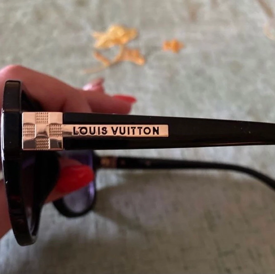 Louis Vuitton Solglasögon  - 91