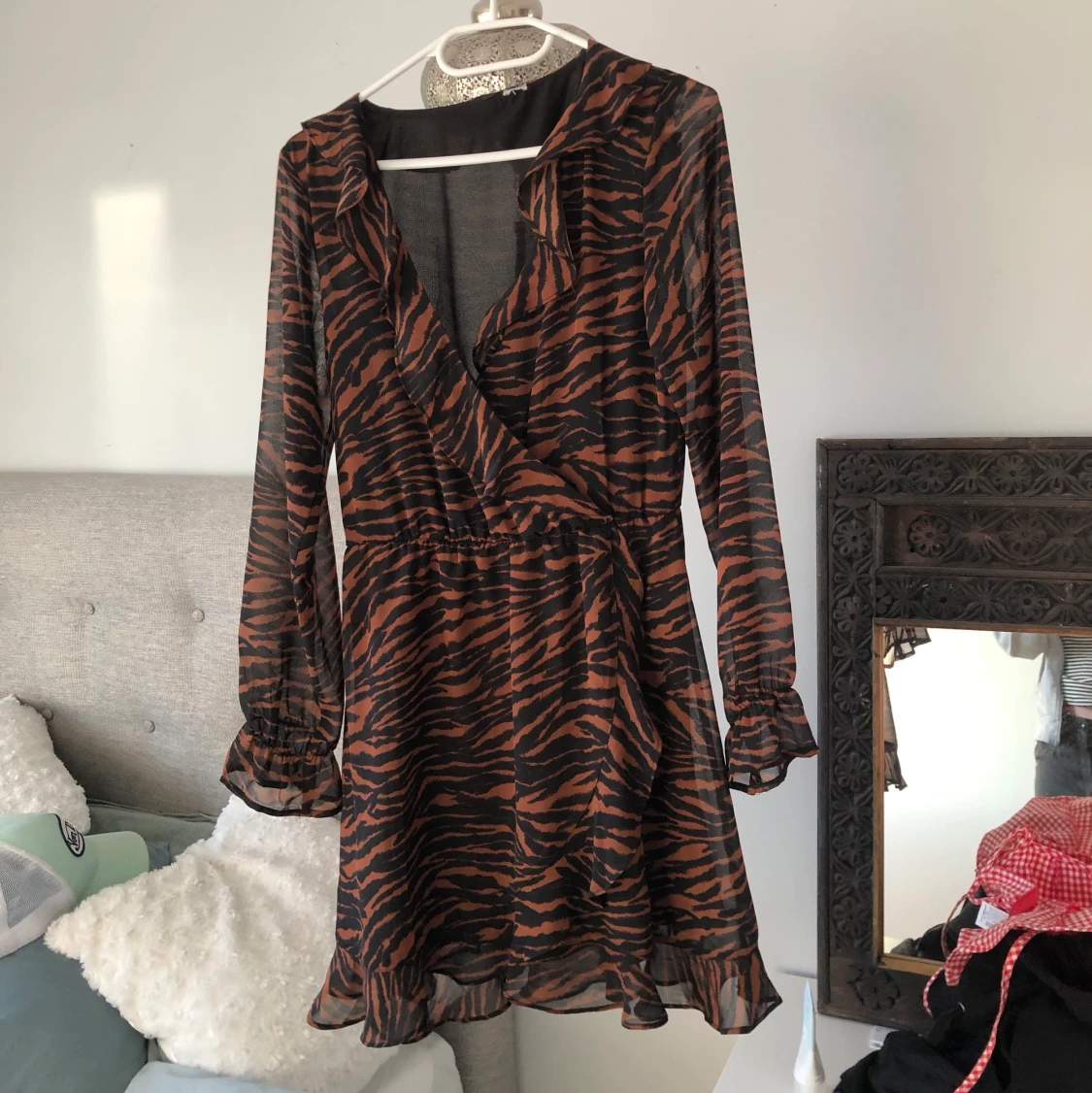 Klänning i brunt zebramönster 