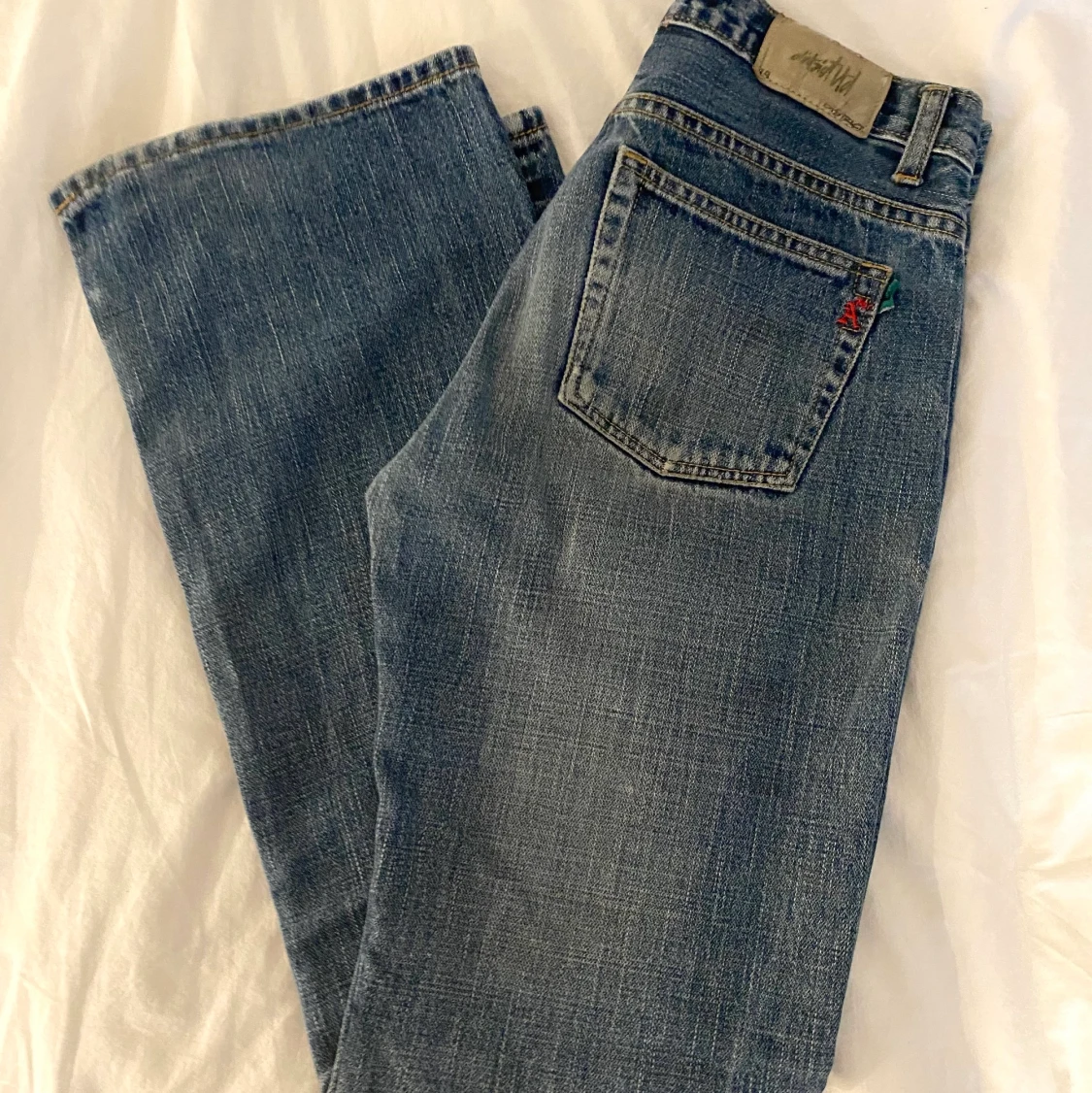 Low-waist flare jeans - 90