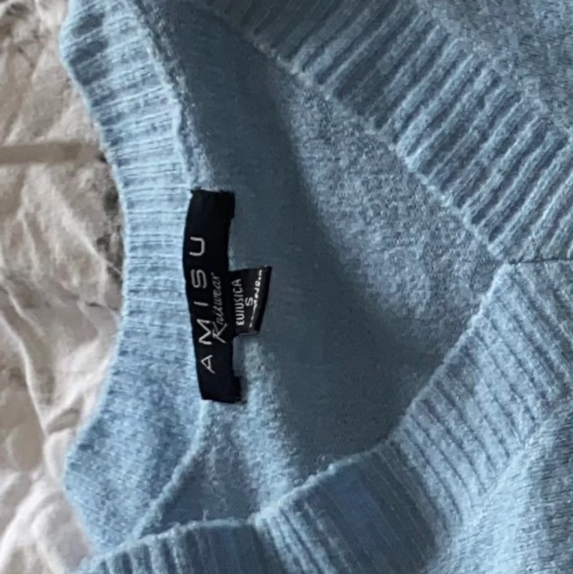 Blå stickad tröja - 90