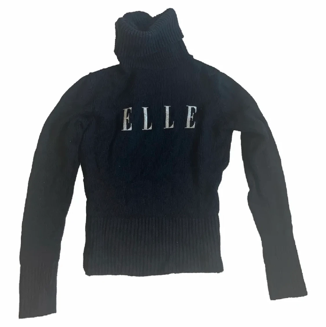 Elle stickad polotröja