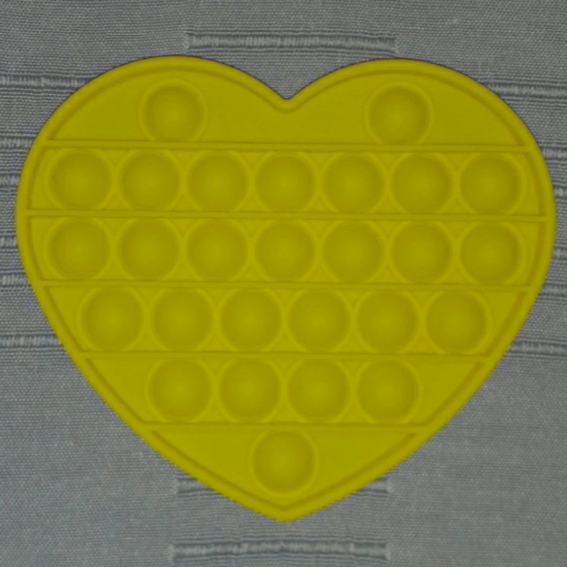 Gul hjärta pop it