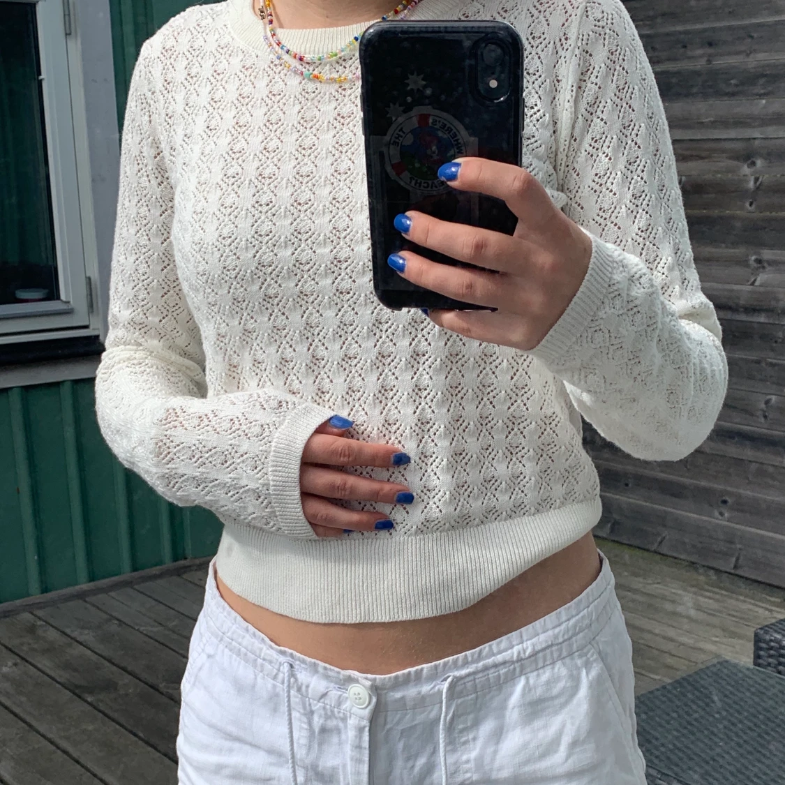 Vit stickad tröja