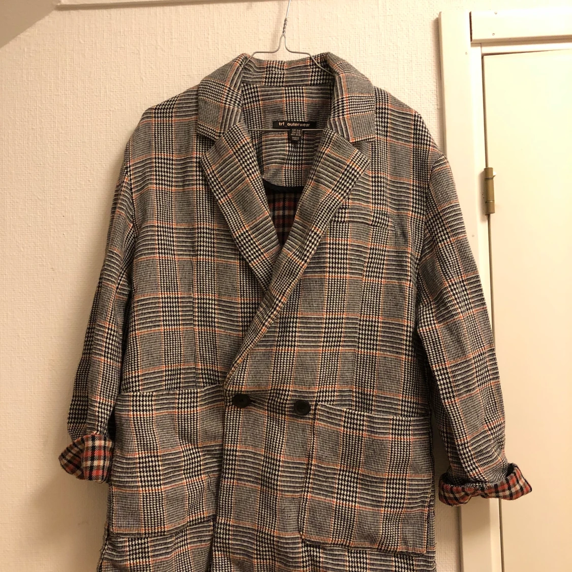 Rutig kappa, sitter som S 