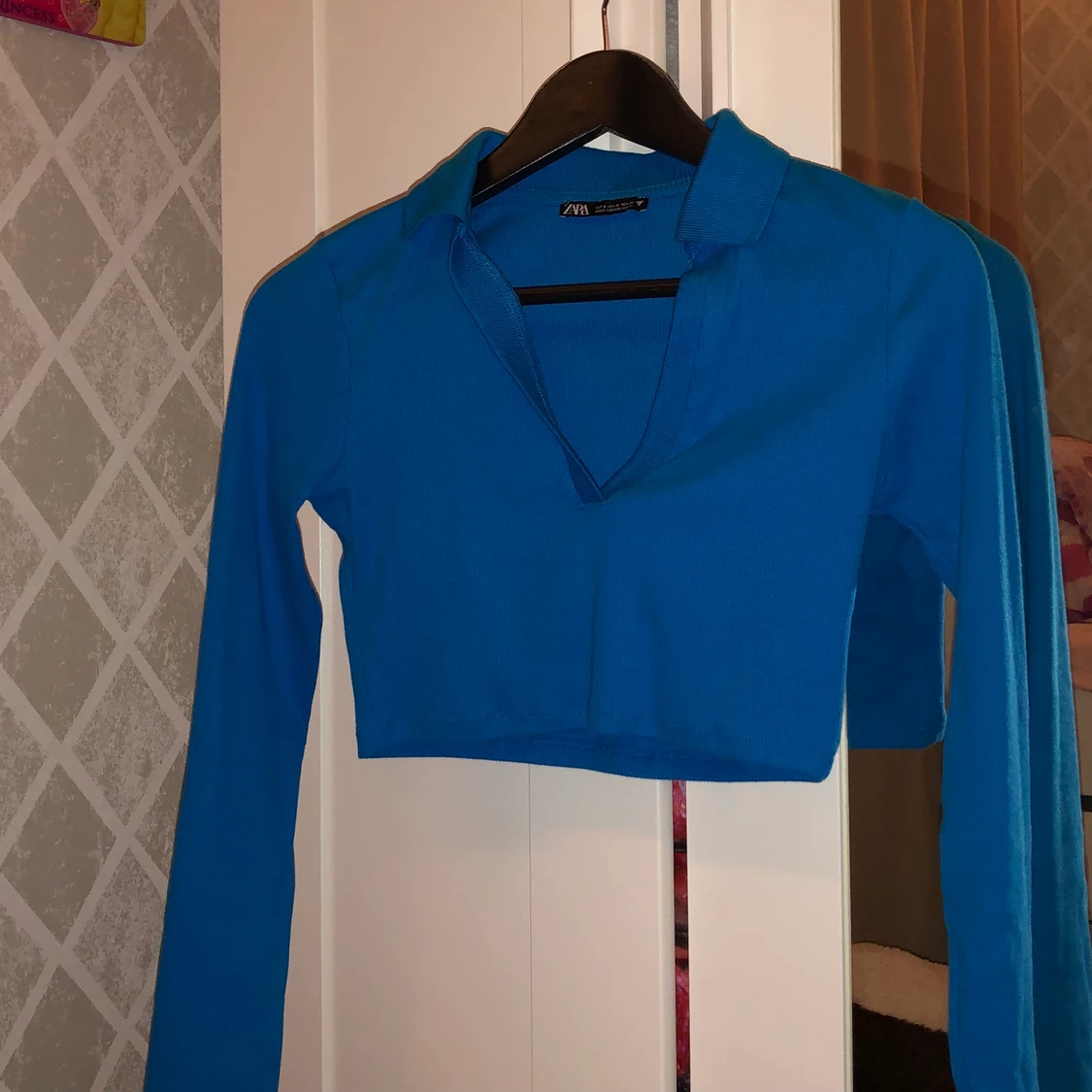 Långarmad tröja med V-ringning blå