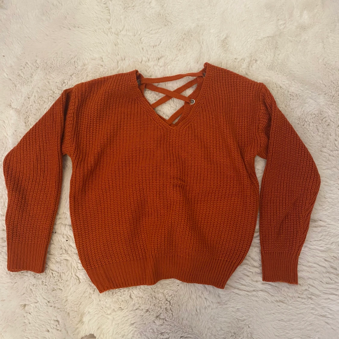 Orange stickad tröja - 91