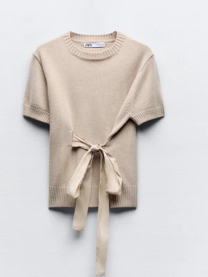 Stickad topp - Superfin populär stickad topp med knyte från zara, slutsåld, använd en gång🩷 
