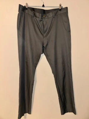 Golfbyxor - Golfbyxor av märket Callaway. Storlek: 54W x 81L