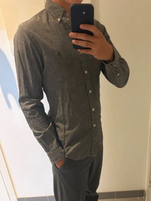 Polo Ralph Lauren skjorta - Säljer min Polo Ralph Lauren skjorta i bra skick, säljs pga används inte jättemycket. Skriv gärna vid intresse!.