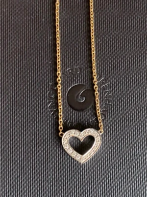 Ole Lynggaard halsband med diamanter 18k guld  - Ole Lynggaard hearts Halsband med 0.16ct naturliga diamanter.  47 cm lång 18k guld.  Nypris 33500kr