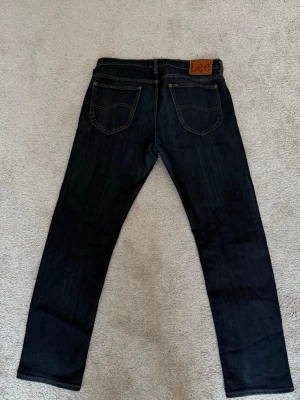  Lee jeans - Tja, jag säljer ett par Lee jeans! Bra skick, storlek W34 L32, modell: Daren - straight fit! 