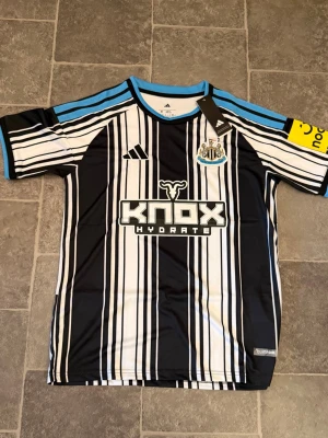 Newcastle United hemma 26/27 - Helt nh