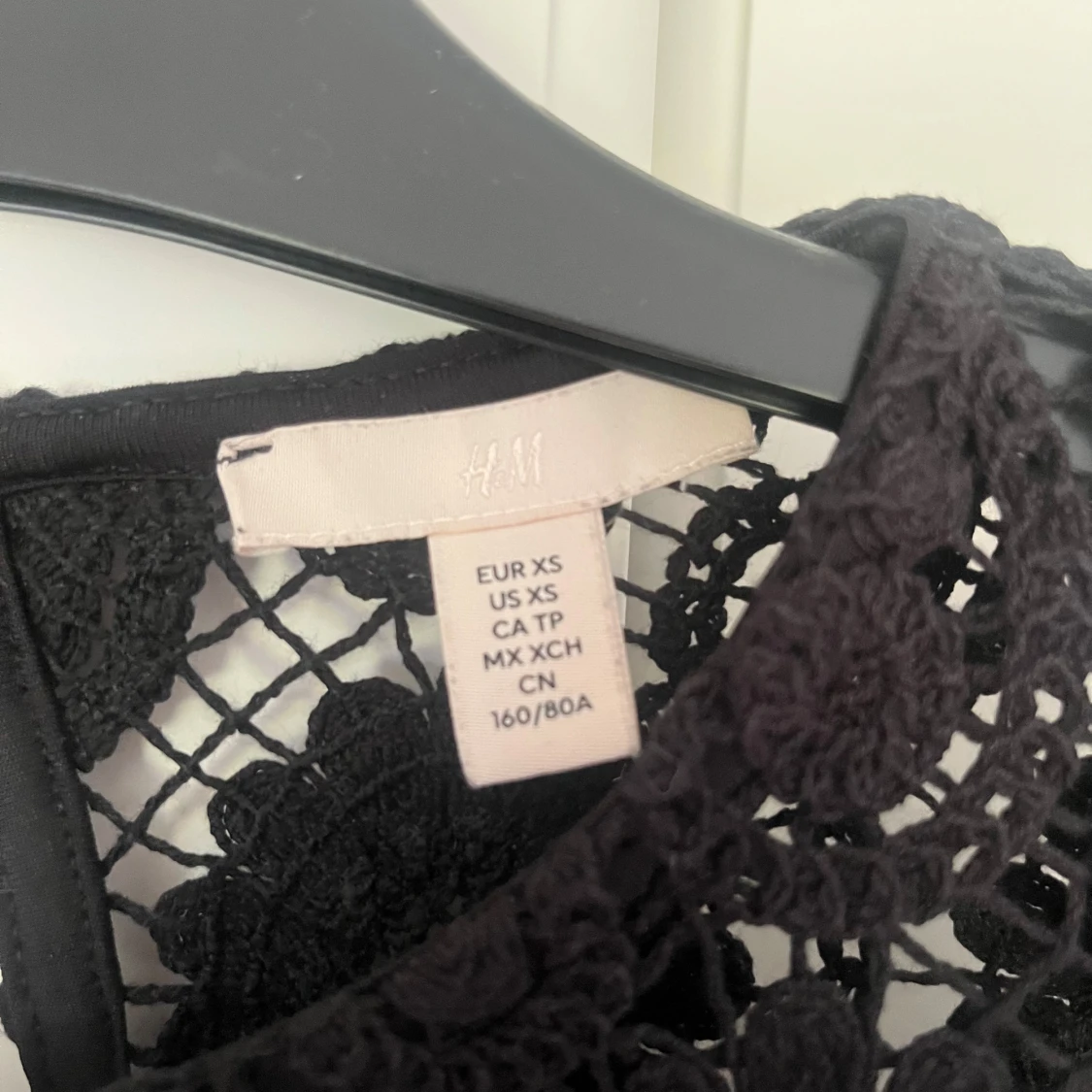 Svart spetsblus från H&M XS - 1