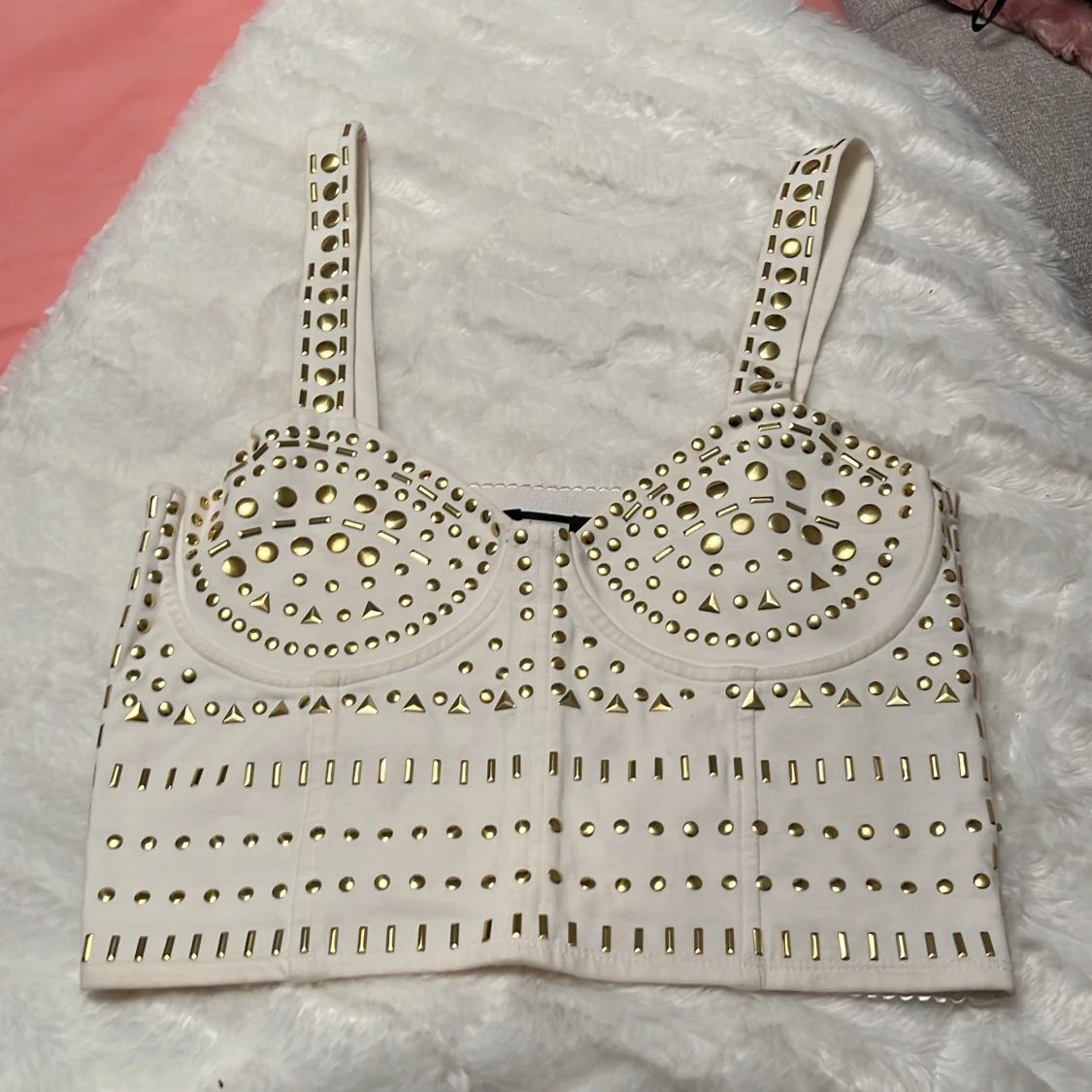 Vit korsettopp med guldnitar