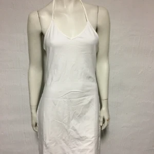 Klänning fr Saint tropp Storlek L - Helt ny klänning från Saint tropez. Knytning runt halsen. Storlek L. Material i stretchig bomullstrikå. 