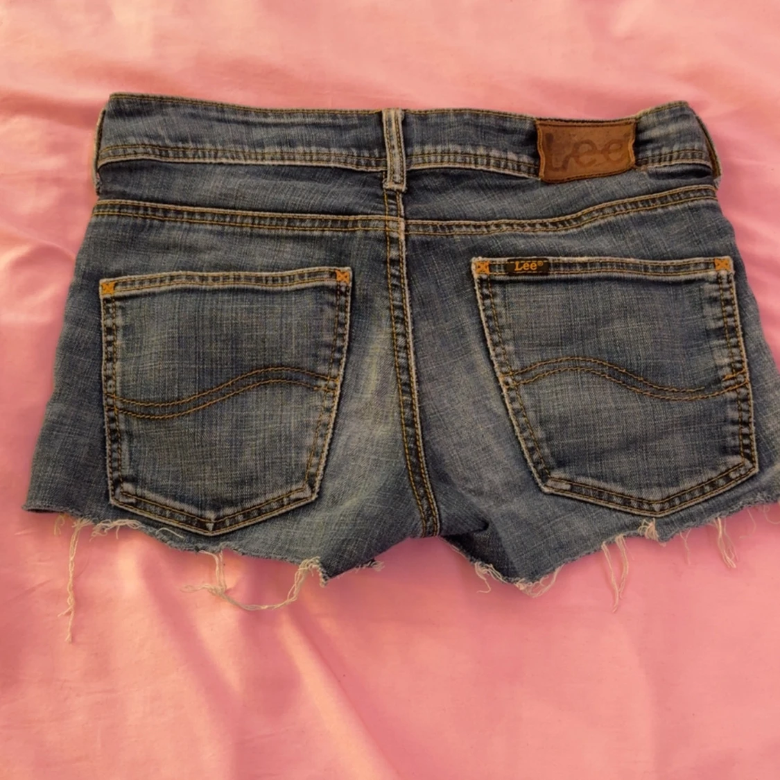Blå jeansshorts från Lee med fransar - 1