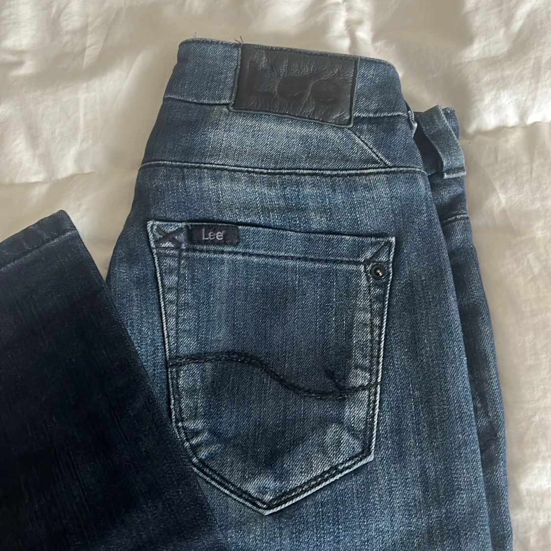 Mörkblå jeans från Lee X-Line W26 - 1
