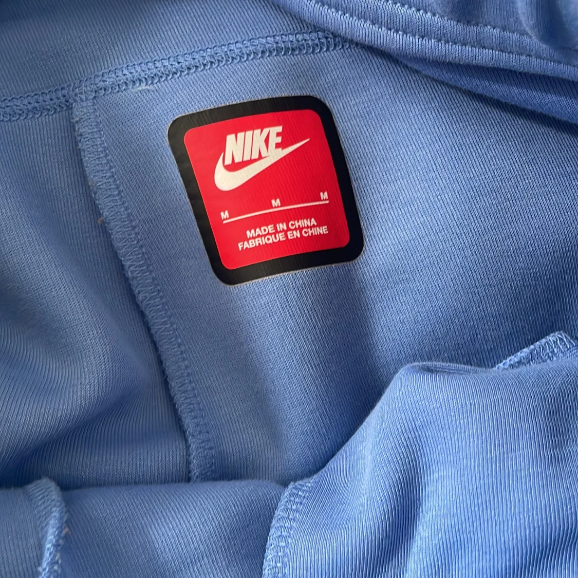 Blå mjukisbyxor från Nike, storlek M - 1