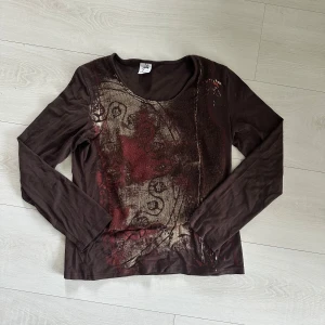 Fin långärmad tröja - Snygg brun långärmad tröja från Jacqueline Riu. Skönt material, väldigt mjuk