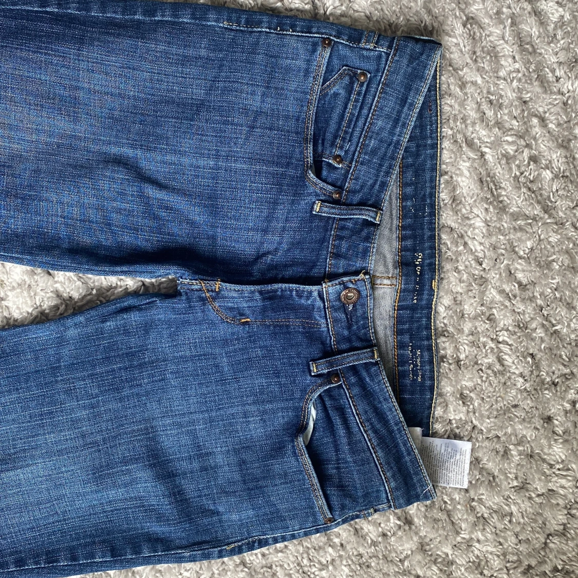 Blå lågmidjase bootcut jeans från Levi's - 4