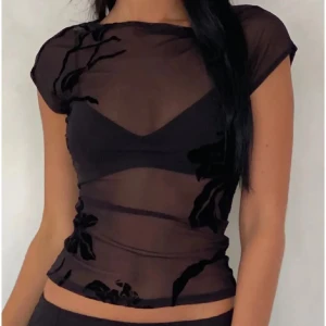 Svart mesh topp - Motelrocks top storlek S, använt 1 gång endast! Nypris ca 400 