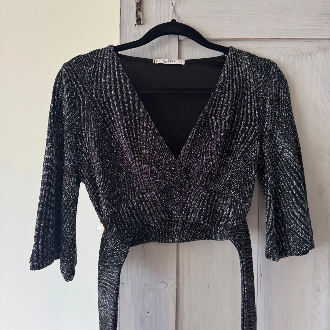 Glittrig omlottopp från Pull&Bear