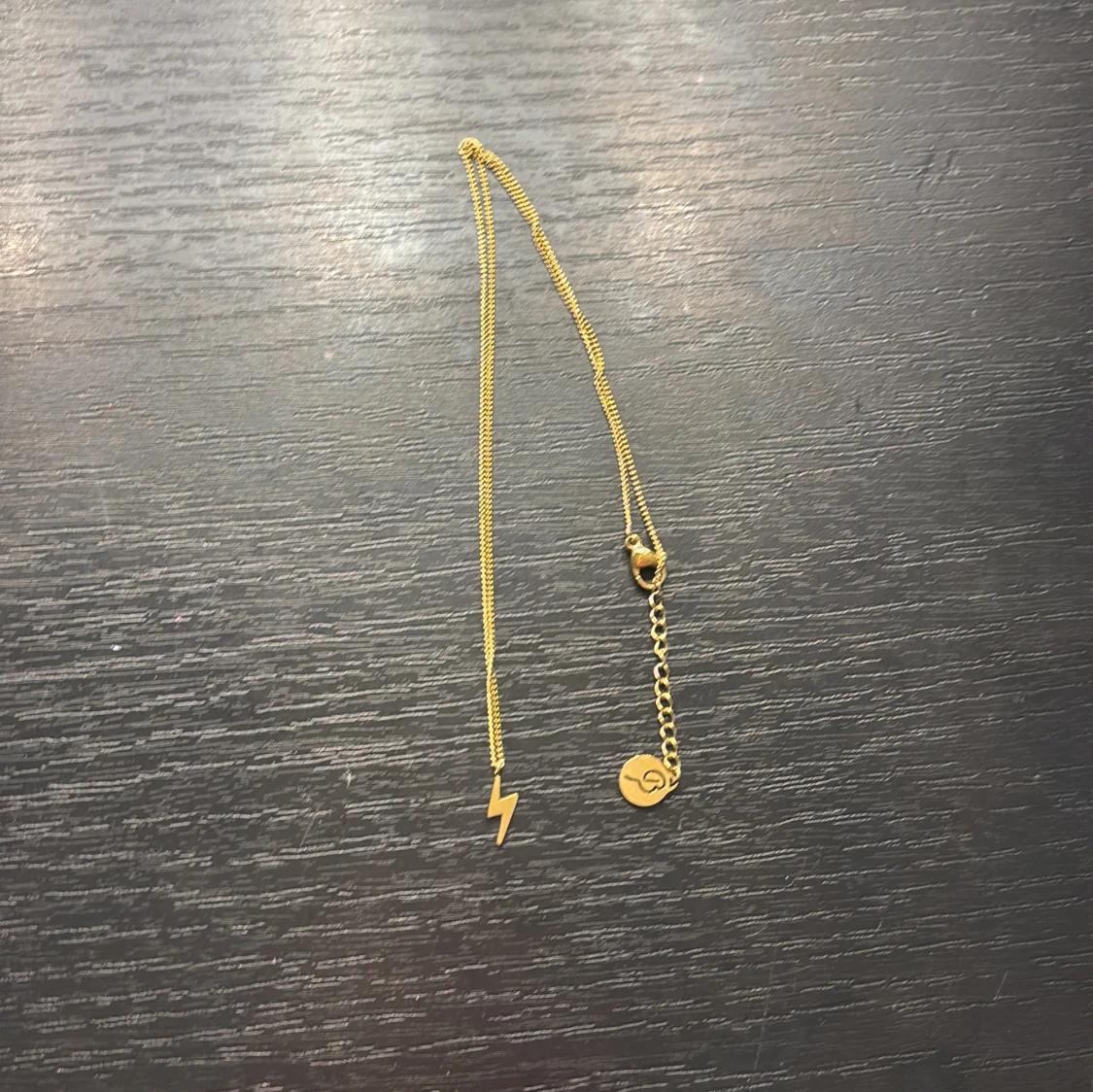 Guldhalsband med blixt