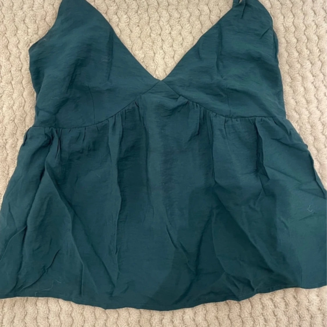 Mörkgrön ärmlös topp