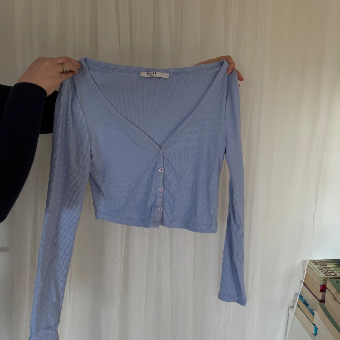 Ljusblå ribbad kofta