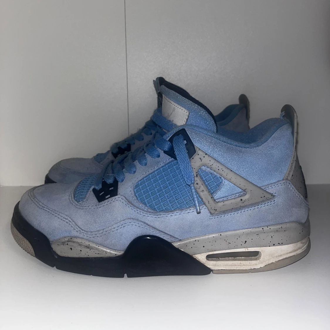 University Blue Nike Air Jordan 4s - 1