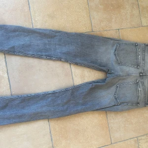 Grå Calvin Klein Jeans  - W30 L30.