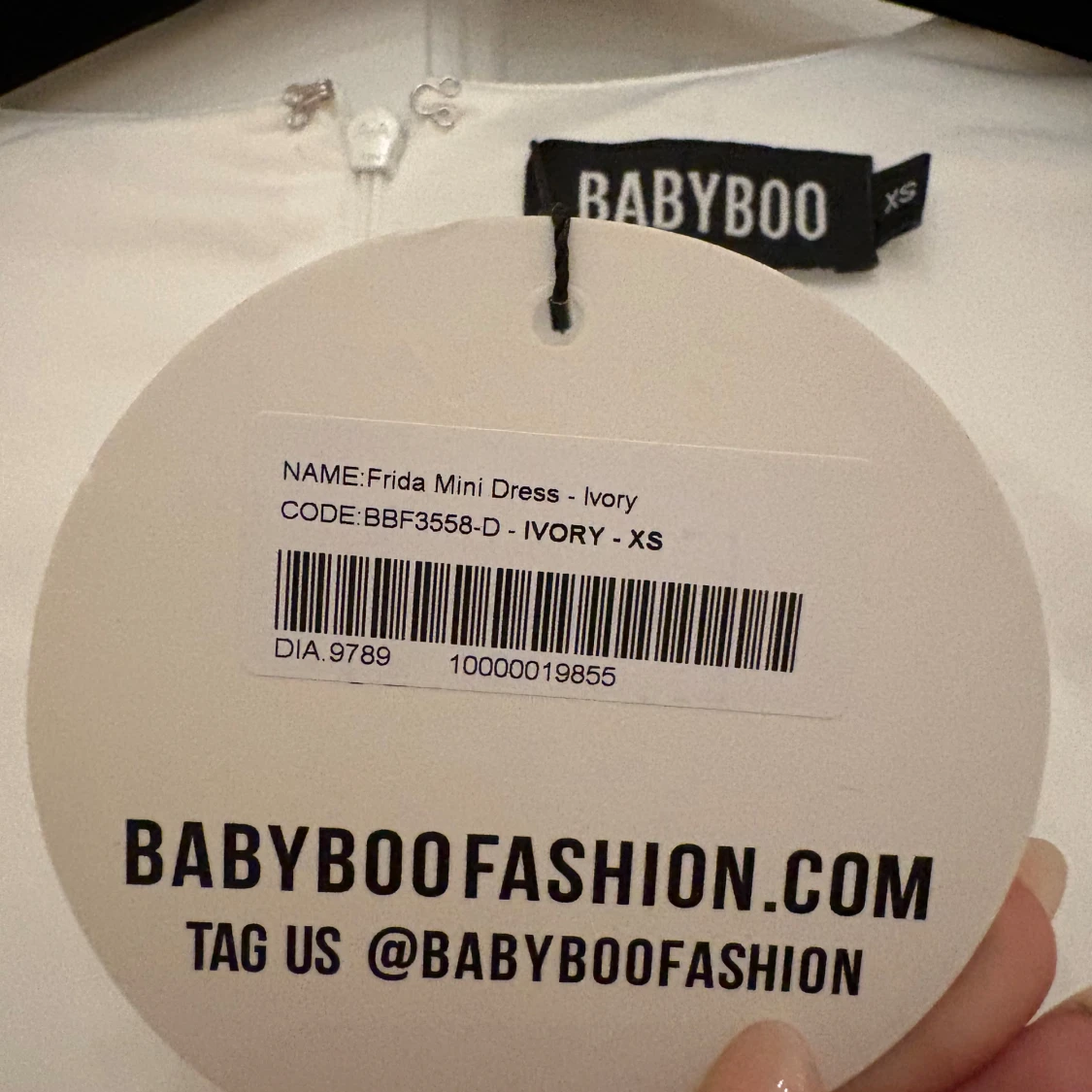 Vit kort klänning från Babyboo XS - 2