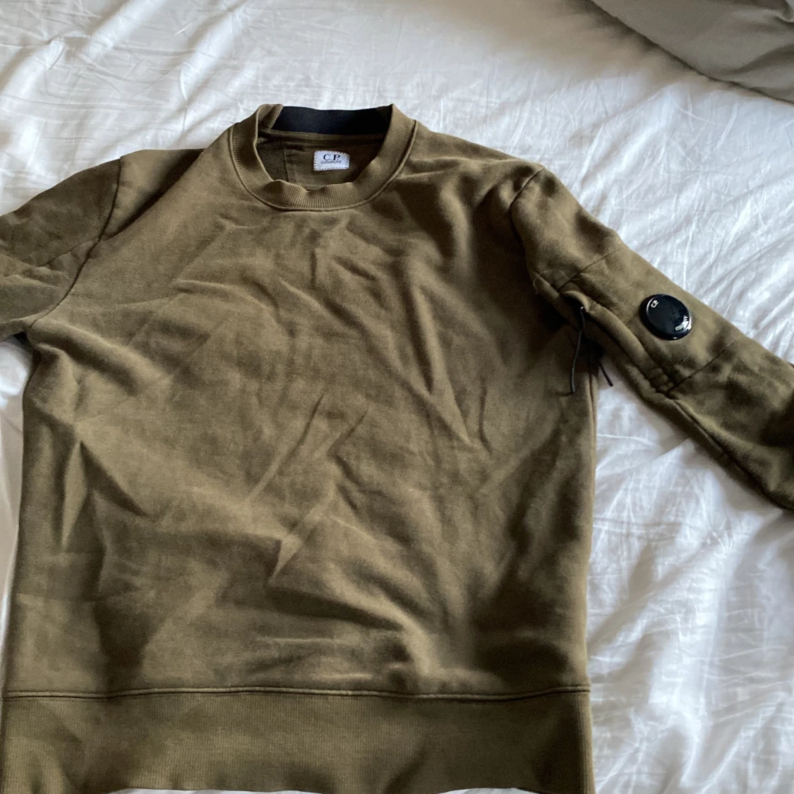 Olivgrön sweatshirt från C.P. Company